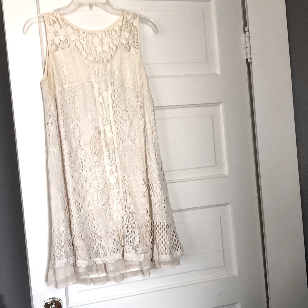 Blue Bird sleeveless lace dress.